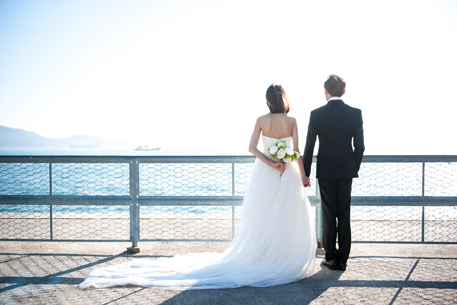 Couple getting married on the water.