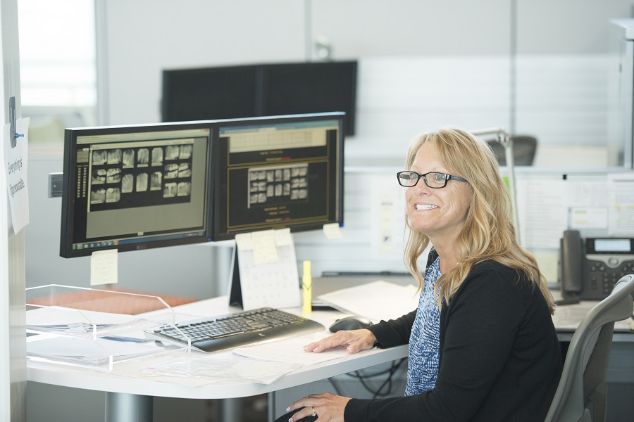 Employee sitting at desk 