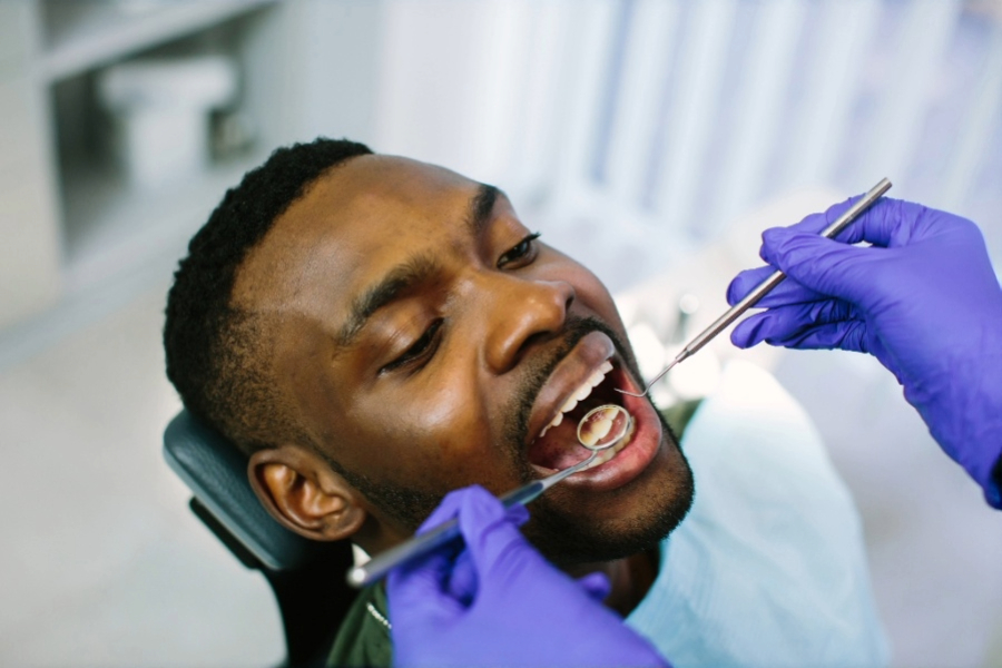 image of man in dental chair getting an oral cancer screening