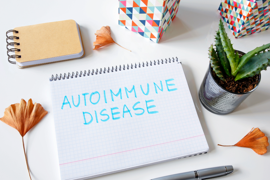 notebook with autoimmune disease written on it