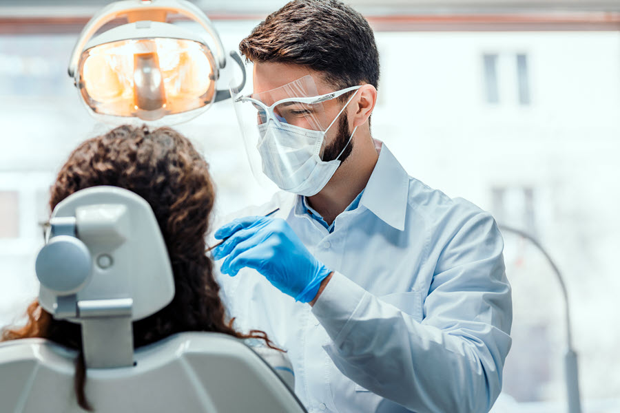 Dentist with patient