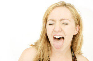 woman sticking out her tongue