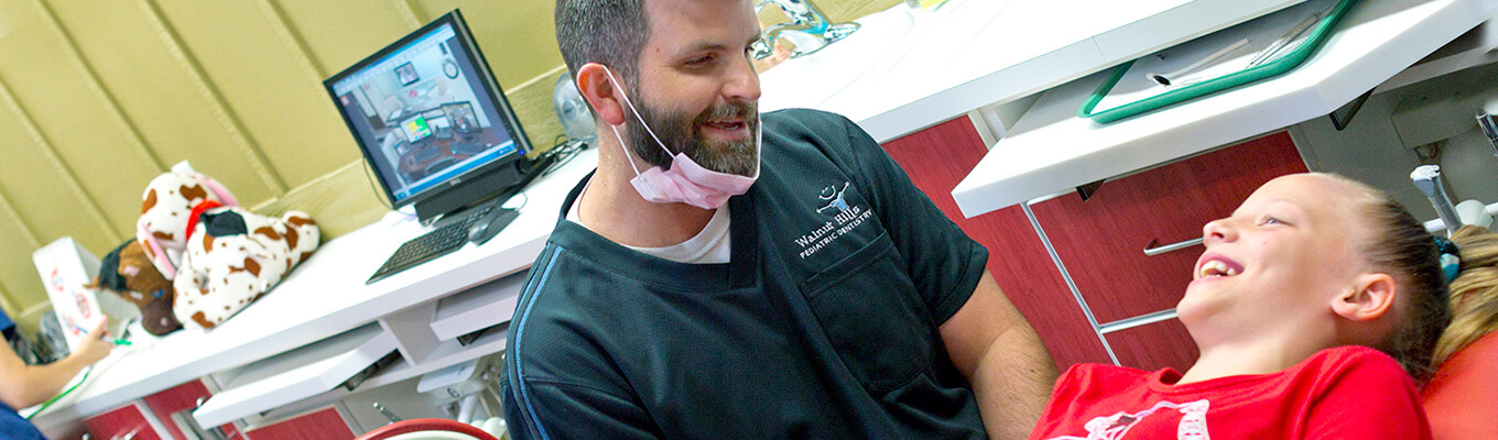 dentist examining child